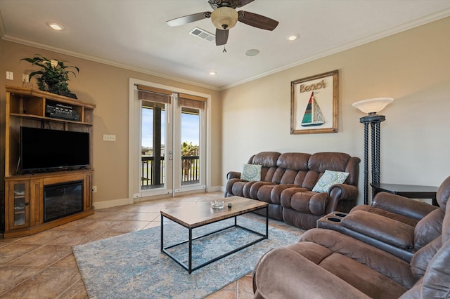 living area featuring baseboards, visible vents, recessed lighting, ceiling fan, and crown molding