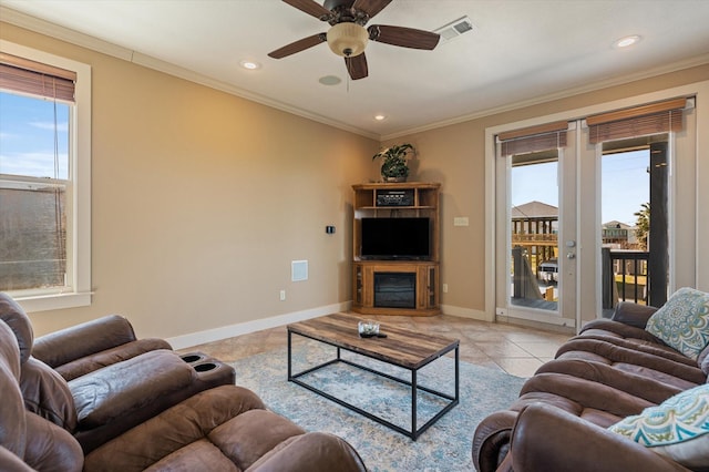 living area with light tile patterned floors, baseboards, visible vents, and ornamental molding