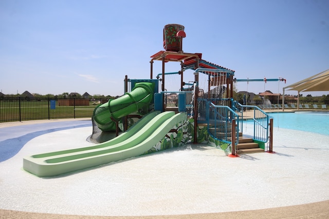 community play area featuring fence