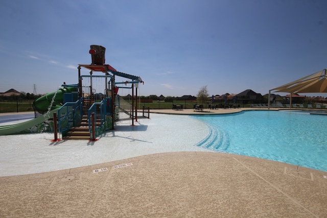 pool with playground community and fence