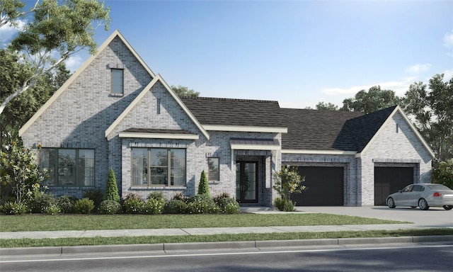 view of front of home with brick siding, an attached garage, concrete driveway, and a front lawn