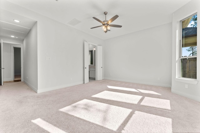 carpeted spare room with recessed lighting, baseboards, and ceiling fan