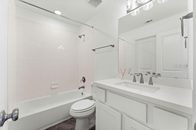 bathroom with visible vents, vanity, toilet, and  shower combination