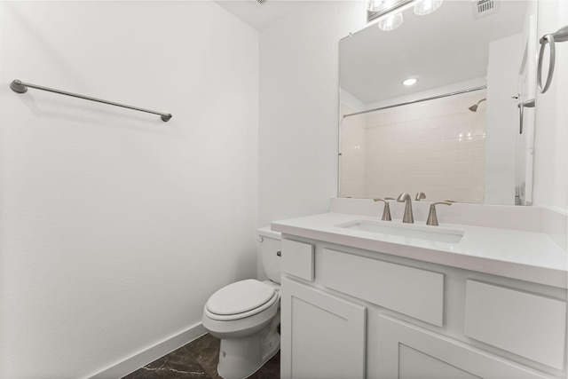 full bathroom featuring visible vents, toilet, baseboards, walk in shower, and vanity