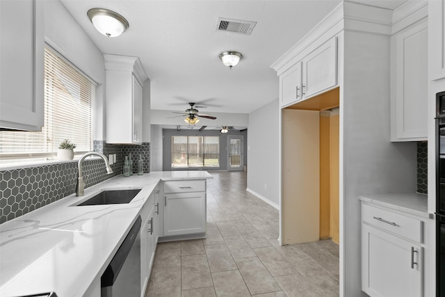 kitchen featuring dishwasher, visible vents, a wealth of natural light, and a sink