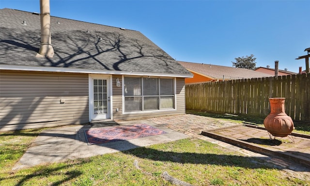 exterior space featuring a patio area and fence