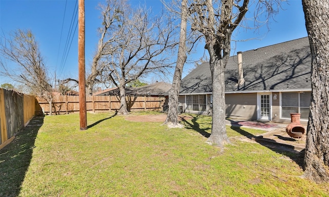 view of yard featuring a fenced backyard