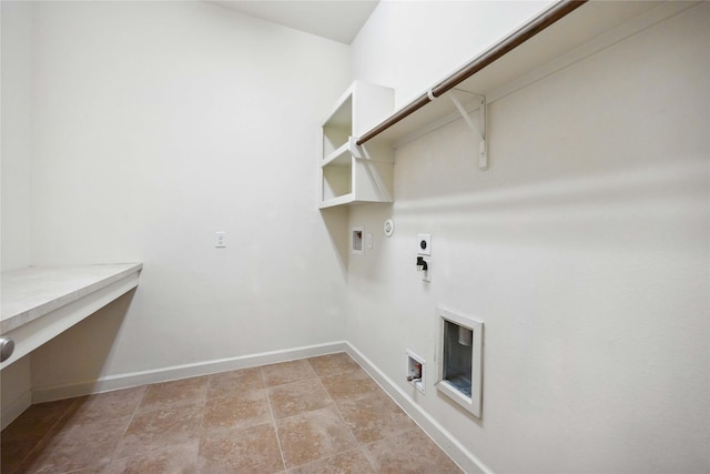 laundry room featuring laundry area, hookup for an electric dryer, gas dryer hookup, and baseboards