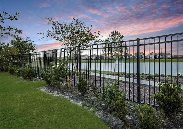 9647 Wright Dr, Manvel, TX 77578 - gate featuring a water view