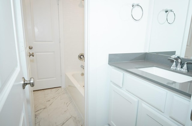 9647 Wright Dr, Manvel, TX 77578 - full bath featuring marble finish floors, vanity, and washtub / shower combination