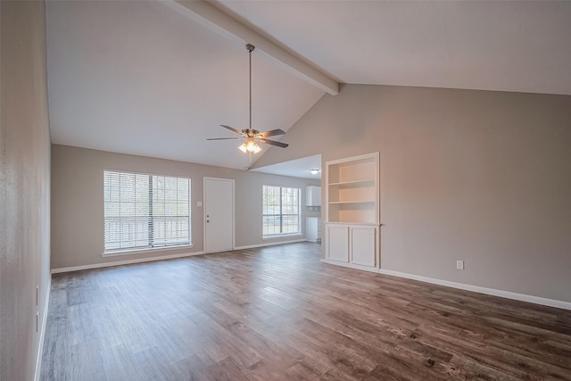 unfurnished living room with beamed ceiling, baseboards, ceiling fan, and wood finished floors