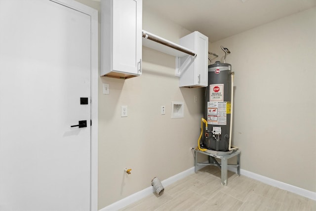 utility room featuring water heater