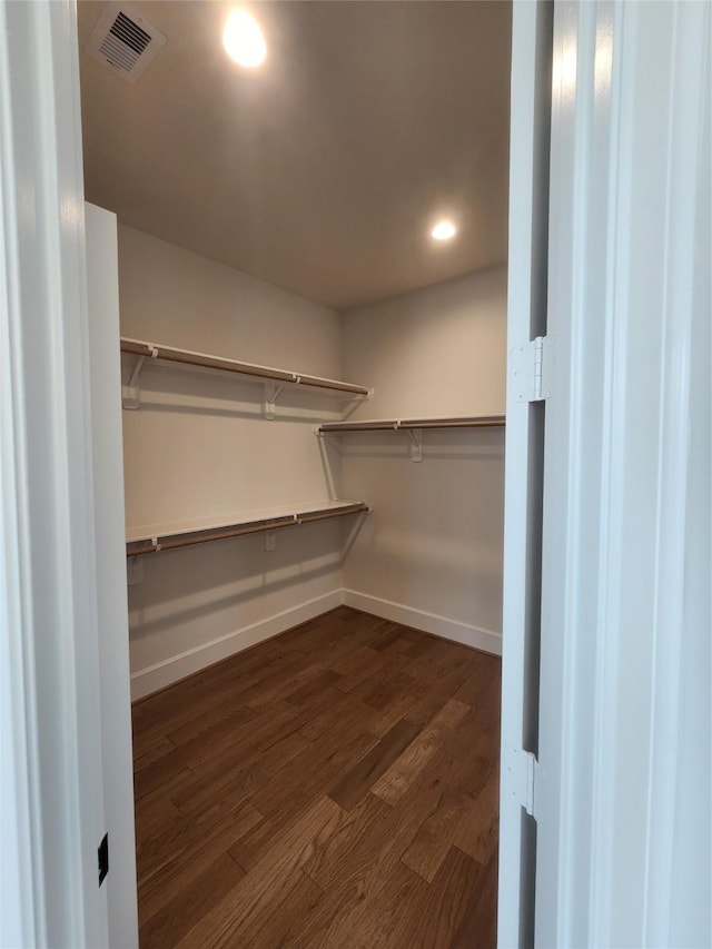 407 Forest Reserve Pl, Houston, TX 77079 - spacious closet with dark wood-type flooring