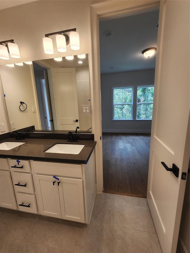 407 Forest Reserve Pl, Houston, TX 77079 - full bathroom with double vanity and tile patterned floors