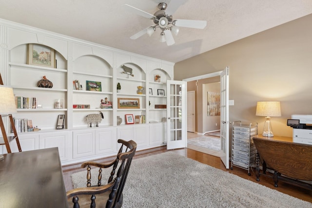 office space with wood finished floors, french doors, and ceiling fan