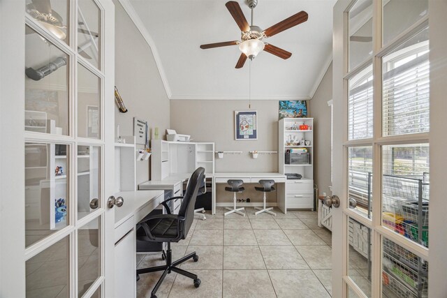 tiled office space featuring a ceiling fan, vaulted ceiling, french doors, and ornamental molding