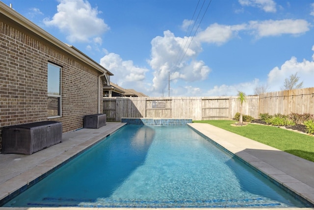 view of swimming pool with a patio area, a fenced in pool, and a fenced backyard