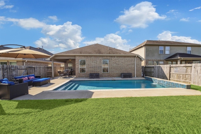 view of swimming pool with a fenced in pool, a lawn, outdoor lounge area, a fenced backyard, and a patio area