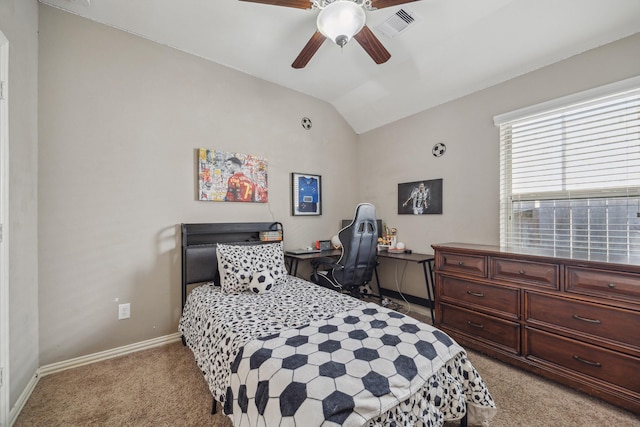 bedroom featuring visible vents, light carpet, a ceiling fan, baseboards, and vaulted ceiling