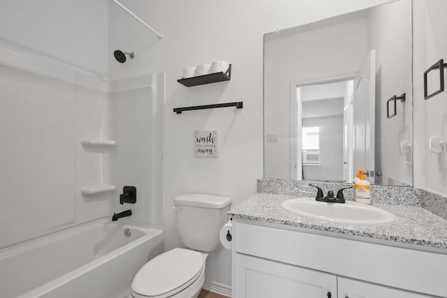 full bath with vanity, toilet, and  shower combination