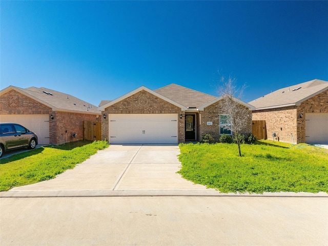 ranch-style house with a garage, brick siding, concrete driveway, and a front lawn