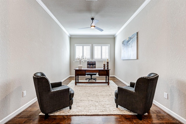 office space featuring baseboards, wood finished floors, a ceiling fan, and crown molding