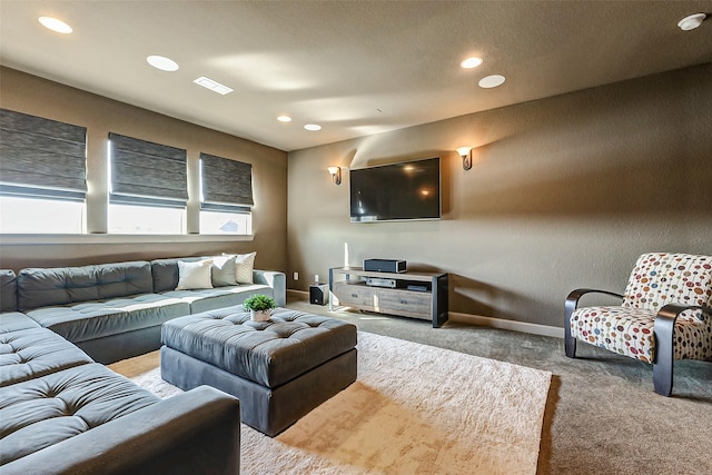 living area featuring carpet flooring, recessed lighting, baseboards, and visible vents