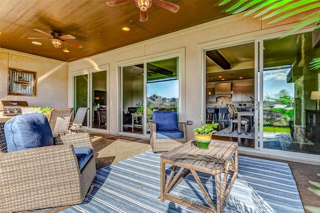 view of patio featuring a ceiling fan