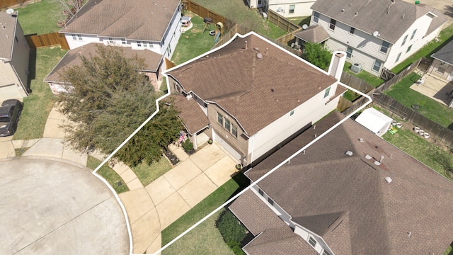 birds eye view of property with a residential view