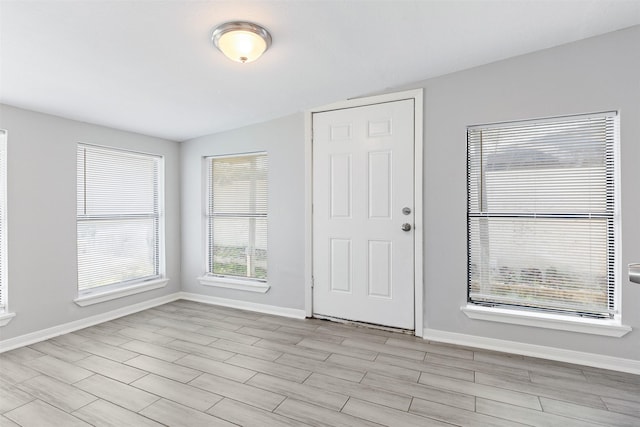 foyer with baseboards