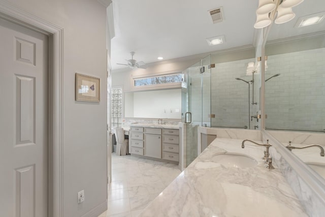 bathroom with visible vents, marble finish floor, a stall shower, ceiling fan, and vanity