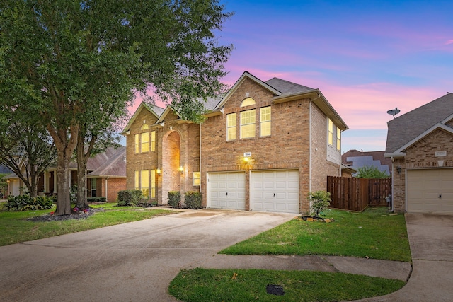 17614 Wind Mist Ln, Cypress, TX 77433 - traditional home with brick siding, concrete driveway, and an attached garage