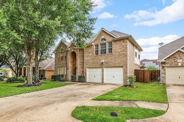 17614 Wind Mist Ln, Cypress, TX 77433 - traditional-style home featuring brick siding, driveway, and an attached garage