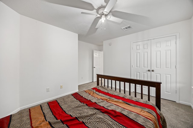 17614 Wind Mist Ln, Cypress, TX 77433 - carpeted bedroom featuring baseboards, a ceiling fan, and a closet