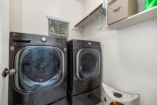 17614 Wind Mist Ln, Cypress, TX 77433 - laundry room featuring separate washer and dryer
