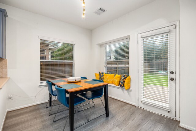 17614 Wind Mist Ln, Cypress, TX 77433 - dining area with wood finished floors and baseboards