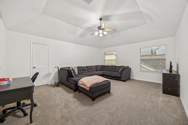 17614 Wind Mist Ln, Cypress, TX 77433 - carpeted living room with a ceiling fan, an office area, a raised ceiling, lofted ceiling, and baseboards