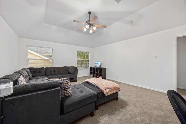 17614 Wind Mist Ln, Cypress, TX 77433 - carpeted living area with a ceiling fan, baseboards, and a tray ceiling