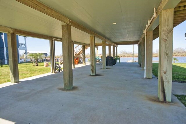 view of patio featuring a water view