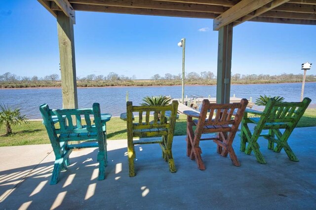 view of patio featuring a water view