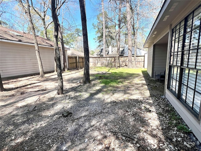 view of yard featuring fence