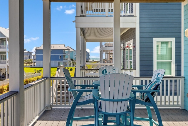 wooden deck with a residential view