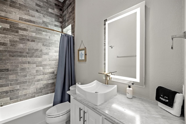 full bath featuring shower / bath combination with curtain, toilet, and vanity