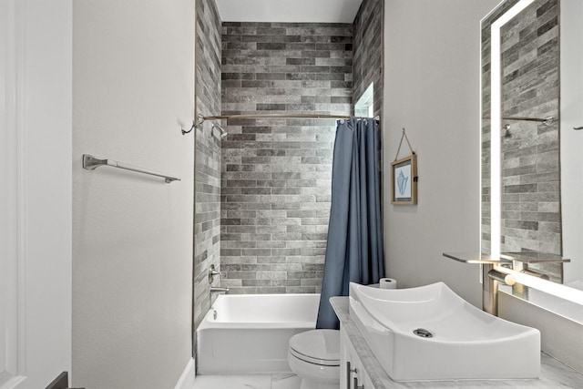 bathroom with vanity, shower / tub combo, toilet, and marble finish floor