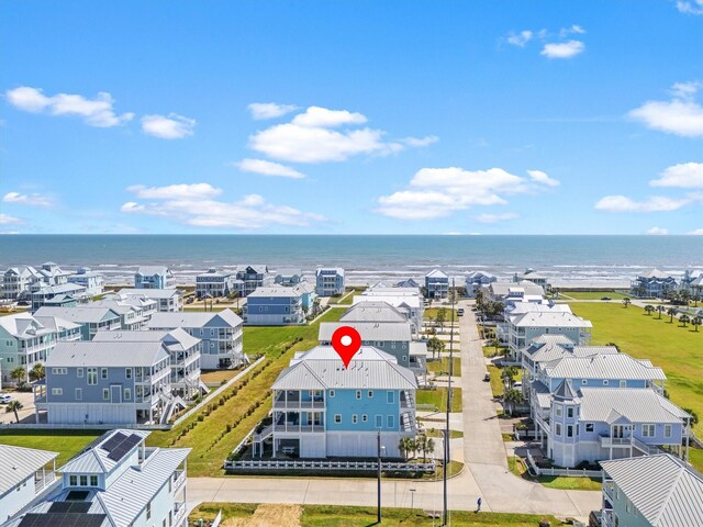 bird's eye view with a residential view and a water view