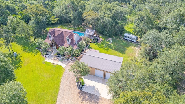 drone / aerial view with a view of trees