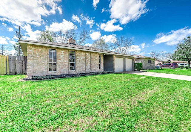 ranch-style house featuring fence, concrete driveway, a front yard, a chimney, and an attached garage