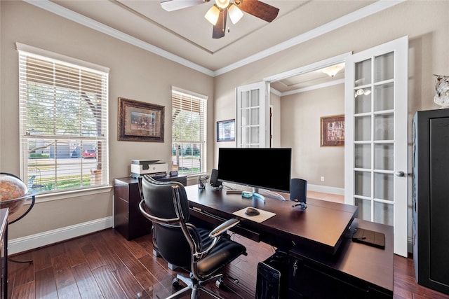 office space featuring a ceiling fan, plenty of natural light, dark wood-style floors, and ornamental molding