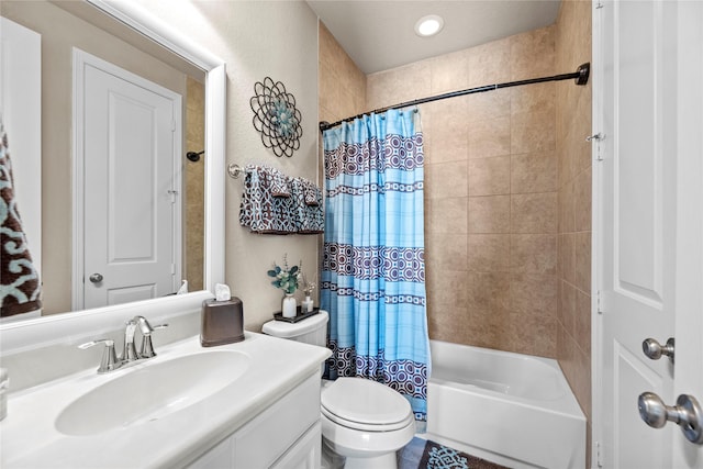 bathroom with vanity, toilet, and shower / bathtub combination with curtain