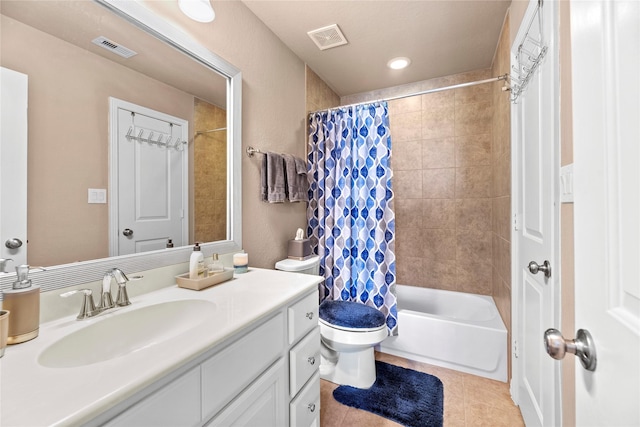 full bath with vanity, tile patterned floors, toilet, and visible vents